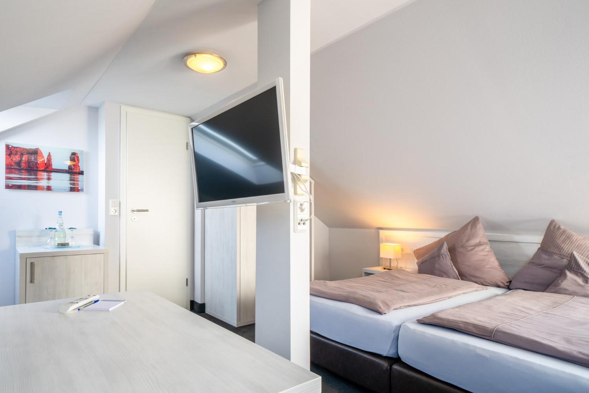 Hotel Hochseeinsel Хельголанд Номер фото